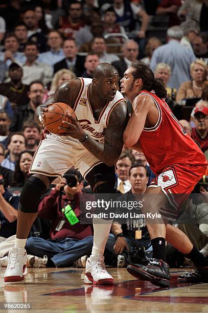 Shaquille O'Neal of the Cleveland Cavaliers posts up against Joakim Noah of the Chicago Bulls in Game Two of the Eastern Conference Quarterfinals...