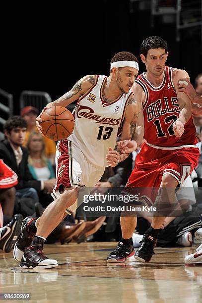 Delonte West of the Cleveland Cavaliers drives against Kirk Hinrich in Game Two of the Eastern Conference Quarterfinals during the 2010 NBA Playoffs...