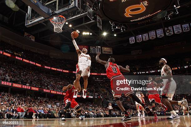 Mo Williams of the Cleveland Cavaliers goes to the basket against Luol Deng of the Chicago Bulls in Game Two of the Eastern Conference Quarterfinals...