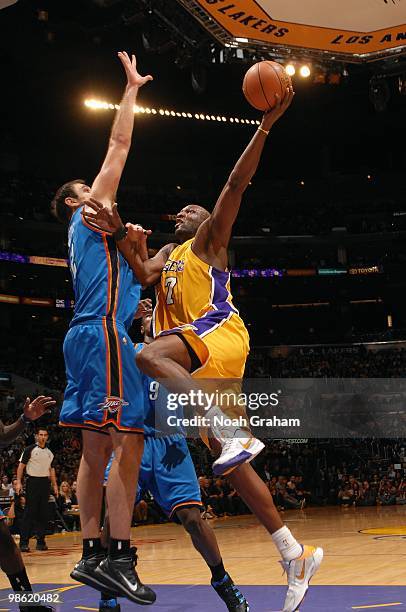 Lamar Odom of the Los Angeles Lakers takes the ball to the basket against Nick Collison of the Oklahoma City Thunder in Game Two of the Western...