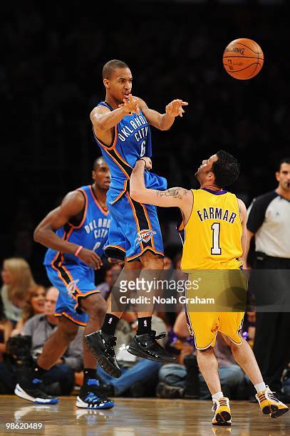 Eric Maynor of the Oklahoma City Thunder passes over Jordan Farmar of the Los Angeles Lakers in Game Two of the Western Conference Quarterfinals...