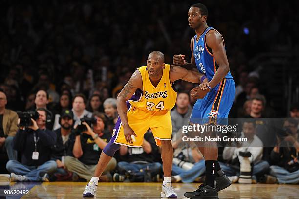 Kobe Bryant of the Los Angeles Lakers and Jeff Green of the Oklahoma City Thunder battle for position in Game Two of the Western Conference...