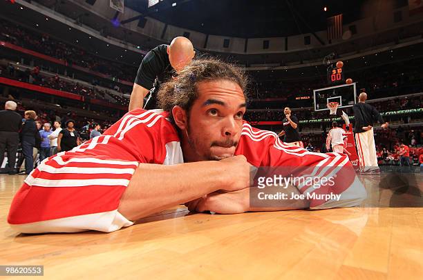 Joakim Noah of the Chicago Bulls gets stretched out prior to the start of Game Three of the Eastern Conference Quarterfinals against the Cleveland...
