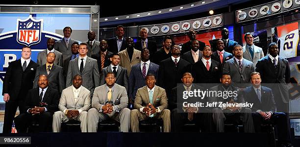 Draft prospects pose for a group photo with former NFL Players including Jerry Rice, Dan Marino, Lawrence Taylor, Deion Sanders, Joe Montana, Floyd...