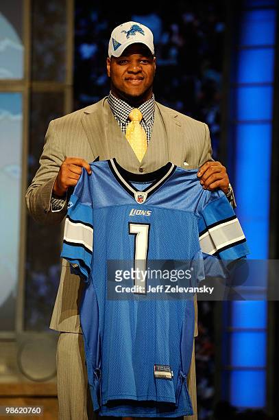 Ndamukong Suh of the Nebraska Cornhuskers holds up a Detroit Lions Jersey after he was picked overall by the Lions during the 2010 NFL Draft at Radio...