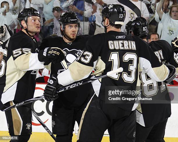 Kris Letang of the Pittsburgh Penguins celebrates his goal with teammates against the Ottawa Senators in Game Five of the Eastern Conference...