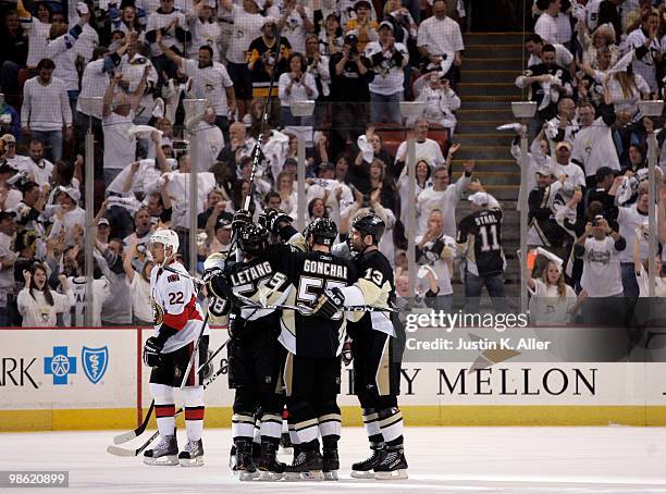 Kris Letang fo the Pittsburgh Penguins celebrates his power play goal with teammates against the Ottawa Senators in Game Five of the Eastern...