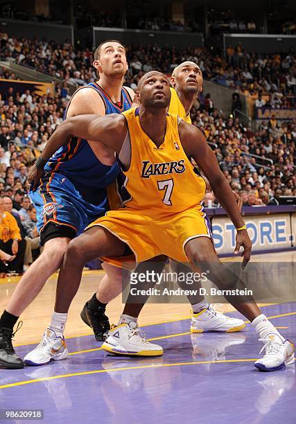 Lamar Odom and Ron Artest of the Los Angeles Lakers box out against Nick Collison of the Oklahoma City Thunder in Game Two of the Western Conference...