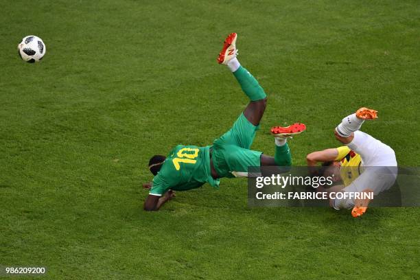 Colombia's defender Santiago Arias vies for the ball with Senegal's forward Sadio Mane during the Russia 2018 World Cup Group H football match...