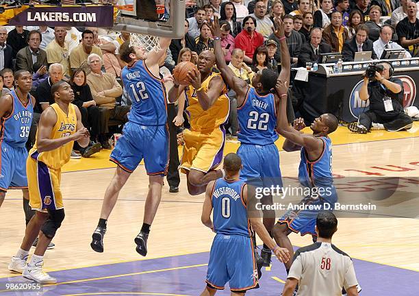 Lamar Odom of the Los Angeles Lakers takes the ball to the basket against Nenad Krstic, Jeff Green, Russell Westbrook and Serge Ibaka of the Oklahoma...