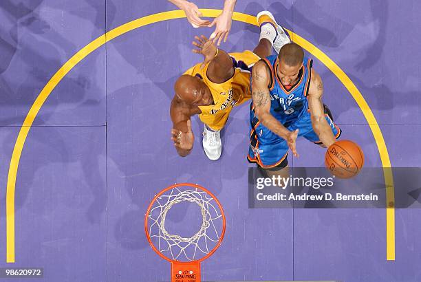 Eric Maynor of the Oklahoma City Thunder shoots a layup against Lamar Odom of the Los Angeles Lakers in Game Two of the Western Conference...