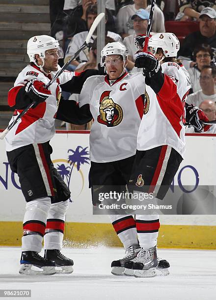 Mike Fisher of the Ottawa Senators celebrates his goal with Daniel Alfredsson and Erik Karlsson against the Pittsburgh Penguins in Game Five of the...