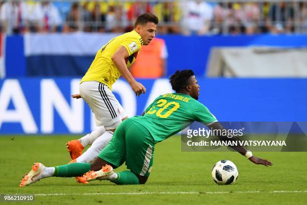 Senegal's forward Keita Balde vies for the ball with Colombia's defender Santiago Arias during the Russia 2018 World Cup Group H football match...