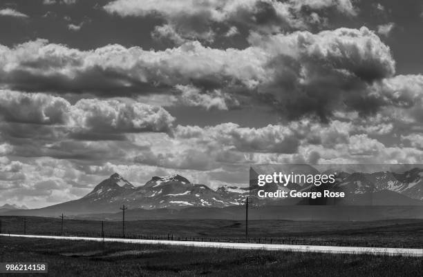 Glacier National Park is viewed from Highway 2 on June 20 near Browning, Montana. Home to Glacier National Park, St. Mary, and dozens of popular...