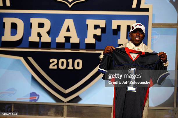 Spiller from the Clemson Tigers holds up a Buffalo Bills jersey after he was selected overall by the Bills during the first round of the 2010 NFL...