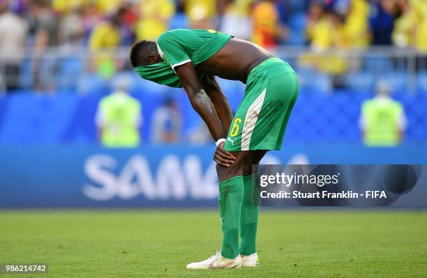 Salif Sane of Senegal looks dejected following his sides defeat in the 2018 FIFA World Cup Russia group H match between Senegal and Colombia at...