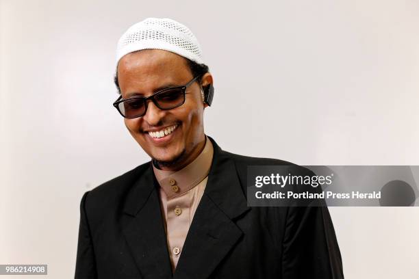 Ahmed Abdirahman, executive director of the Maine Muslim Community Center, poses for a portrait after Eid prayers on Friday at the Portland Expo. The...