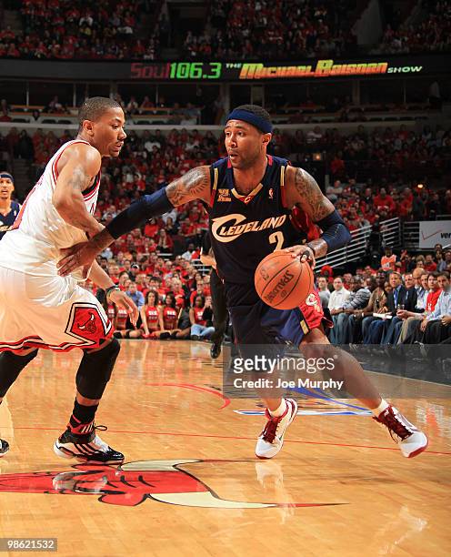 Mo Williams of the Cleveland Cavaliers drives past Derrick Rose of the Chicago Bulls in Game Three of the Eastern Conference Quarterfinals during the...