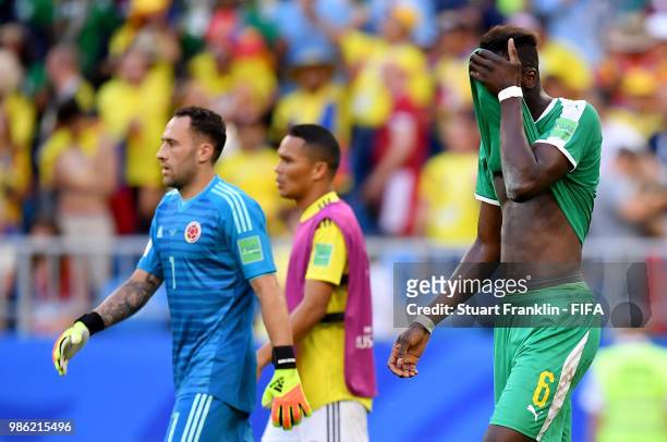 Salif Sane of Senegal looks dejected following his sides defeat in the 2018 FIFA World Cup Russia group H match between Senegal and Colombia at...