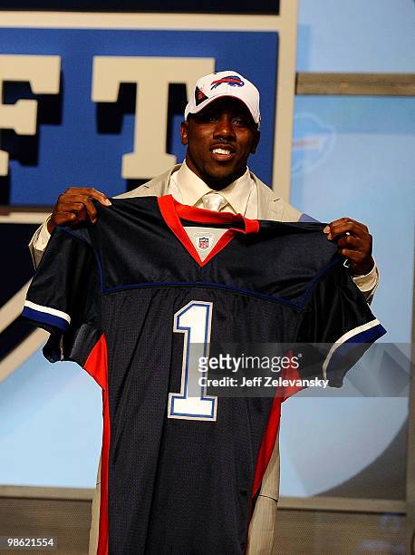 Spiller from the Clemson Tigers holds up a Buffalo Bills jersey after he was selected overall by the Bills during the first round of the 2010 NFL...