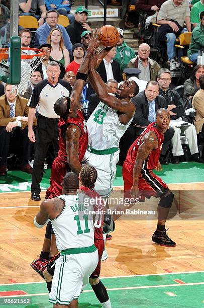 Kendrick Perkins of the Boston Celtics goes up for a shot against Jermaine O'Neal of the Miami Heat in Game Two of the Eastern Conference...
