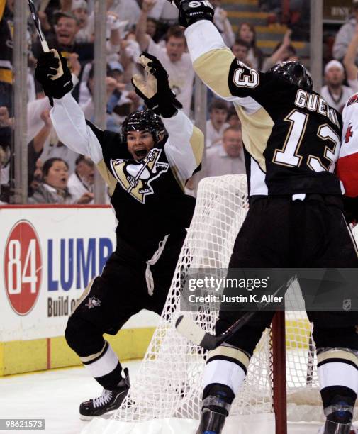 Chris Kunitz of the Pittsburgh Penguins celebrates his goal late in the second period against the Ottawa Senators in Game Five of the Eastern...