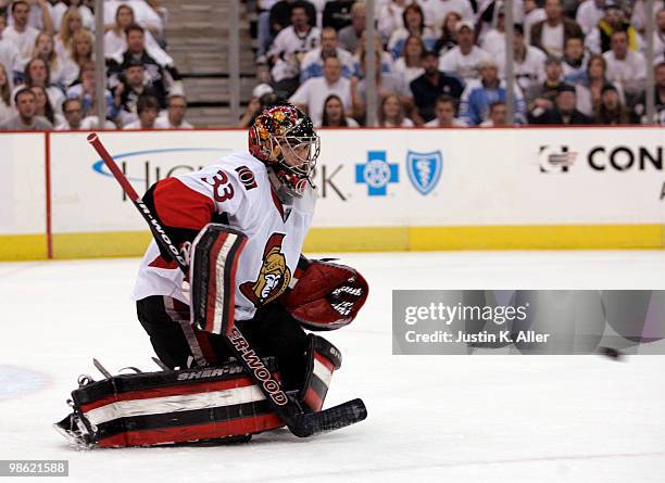 Pascal Leclaire of the Ottawa Senators makes a save against the Pittsburgh Penguins in Game Five of the Eastern Conference Quarterfinals during the...