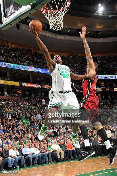 Tony Allen of the Boston Celtics shoots a layup against Michael Beasley of the Miami Heat in Game Two of the Eastern Conference Quarterfinals during...