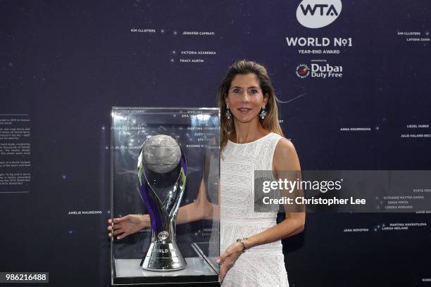 Nine-time Grand Slam champion Monica Seles poses with the World Number 1 trophy as she attended the Womens Tennis Associations Tennis on the Thames...