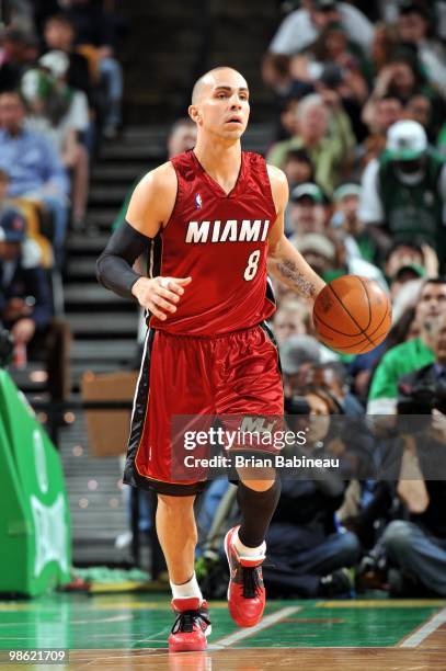 Carlos Arroyo of the Miami Heat moves the ball up court in Game Two of the Eastern Conference Quarterfinals against the Boston Celtics during the...