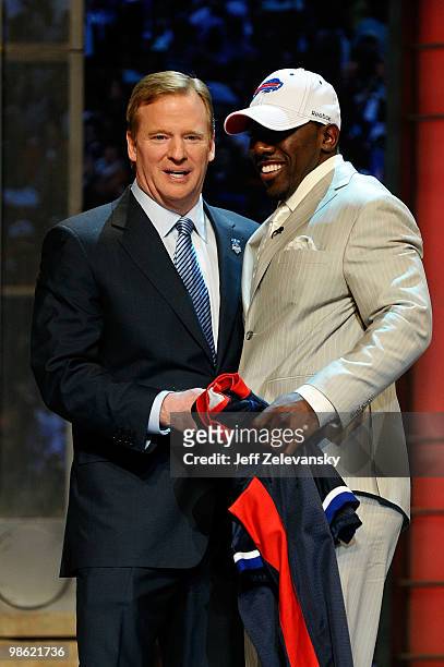 Spiller from the Clemson Tigers greets NFL Commissioner Roger Goodell after Spiller was selected overall by the Buffalo Bills during the first round...