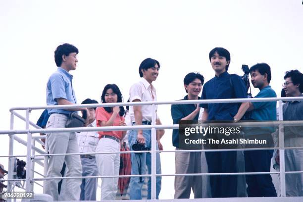 Prince Fumihito is seen with his friends during their trip to Aomori at Lake Towada on August 10, 1987 in Towada, Aomori, Japan.