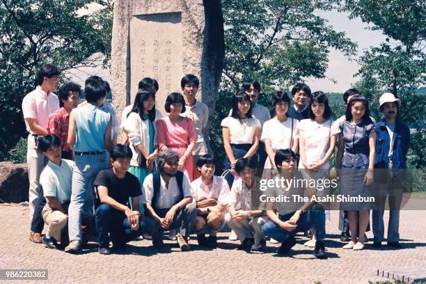 Prince Fumihito and Kiko Kawashima are seen with their friends during their trip in front of the Takuboku Ishikawa memorial on August 12, 1987 in...