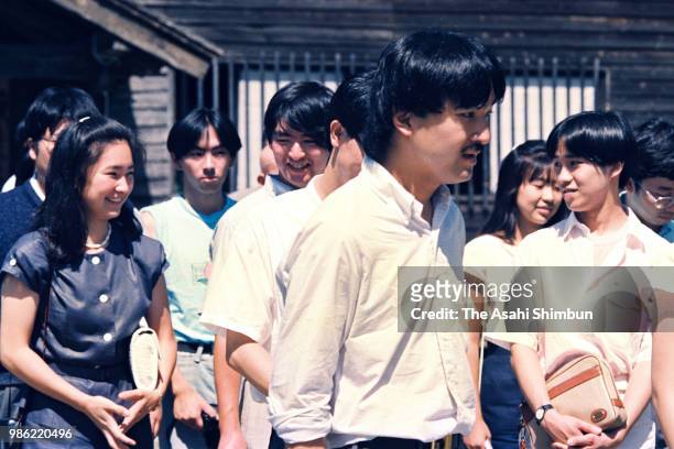 Prince Fumihito and Kiko Kawashima are seen with their friends during their trip on August 12, 1987 in Tamayama, Iwate, Japan.