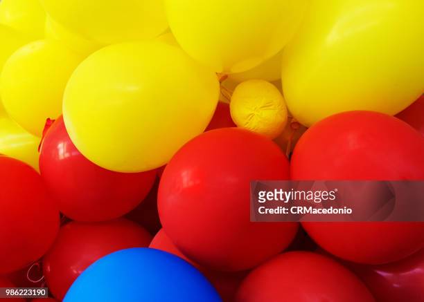 party balloons and colors. - crmacedonio stock pictures, royalty-free photos & images
