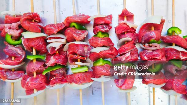 preparing meat steak with vegetables. - crmacedonio foto e immagini stock
