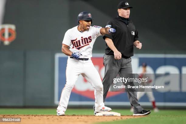 Eduardo Escobar of the Minnesota Twins celebrates against the Boston Red Sox on June 19, 2018 at Target Field in Minneapolis, Minnesota. The Twins...