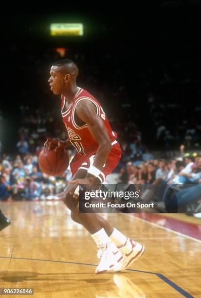 Armstrong of the Chicago Bulls dribbles the ball against the Washington Bullets during an NBA basketball game circa 1990 at the Capital Centre in...