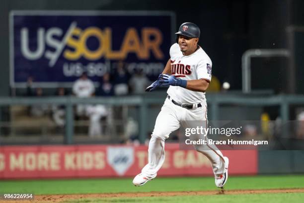 Eduardo Escobar of the Minnesota Twins runs against the Boston Red Sox on June 19, 2018 at Target Field in Minneapolis, Minnesota. The Twins defeated...