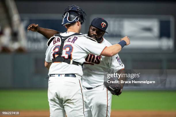 Fernando Rodney of the Minnesota Twins celebrates with Mitch Garver against the Boston Red Sox on June 19, 2018 at Target Field in Minneapolis,...