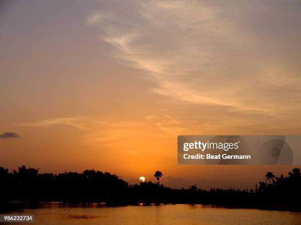 sunset backwaters - germann stock-fotos und bilder