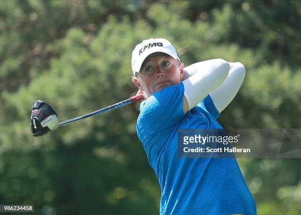 Stacy Lewis watches her tee shot on the eighth hole during the first round of the KPMG Women's PGA Championship at Kemper Lakes Golf Club on June 28,...