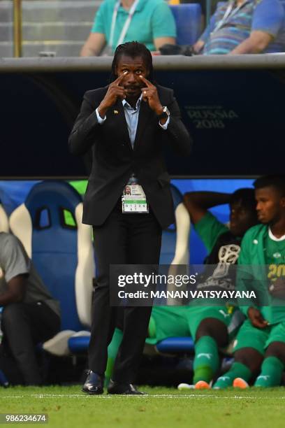 Senegal's coach Aliou Cisse gestures and reacts during the Russia 2018 World Cup Group H football match between Senegal and Colombia at the Samara...