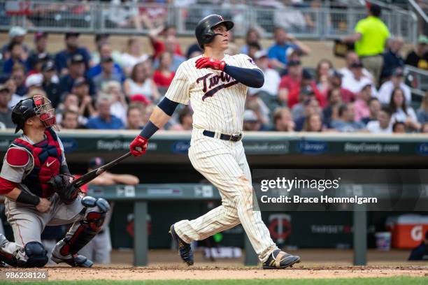 Logan Morrison of the Minnesota Twins bats against the Boston Red Sox on June 20, 2018 at Target Field in Minneapolis, Minnesota. The Twins defeated...