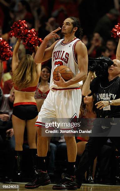 Joakim Noah of the Chicago Bulls blows a kiss to fans as he celebrates a win over the Cleveland Cavaliers in Game Three of the Eastern Conference...