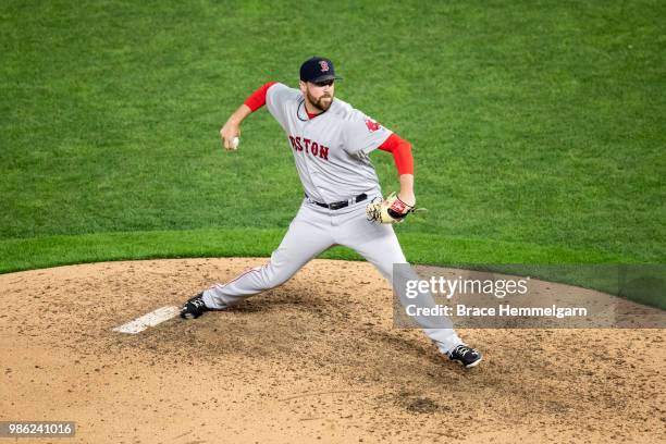 Heath Hembree of the Boston Red Sox pitches against the Minnesota Twins on June 20, 2018 at Target Field in Minneapolis, Minnesota. The Twins...