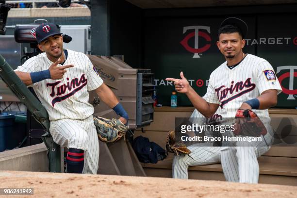 Eddie Rosario of the Minnesota Twins looks on with Eduardo Escobar against the Boston Red Sox on June 20, 2018 at Target Field in Minneapolis,...
