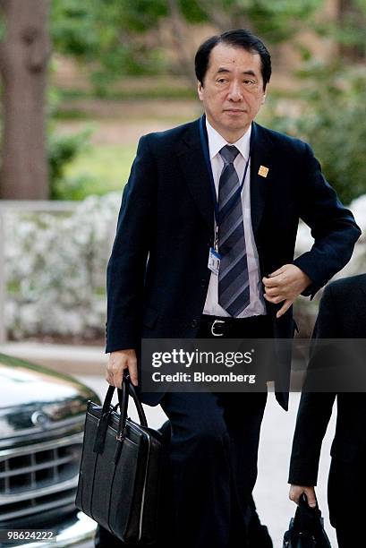 Naoto Kan, Japan's finance minister, arrives at the Canadian embassy for a dinner with the finance ministers and central bankers of the Group of...