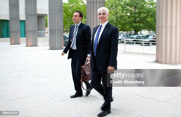 Alistair Darling, U.K. Chancellor of the exchequer, right, arrives at the Canadian embassy for a dinner with the finance ministers and central...