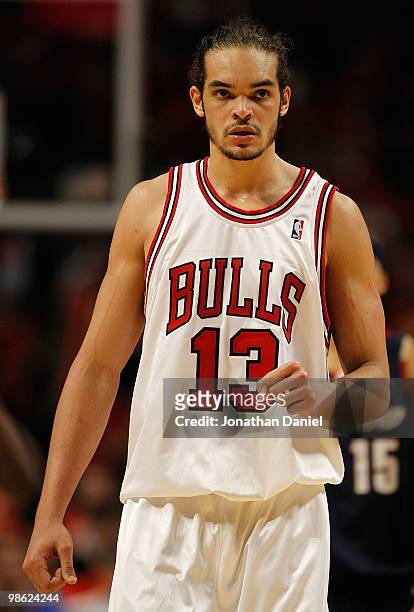 Joakim Noah of the Chicago Bulls pumps his fist in celebration in the final seconds against the Cleveland Cavaliers in Game Three of the Eastern...